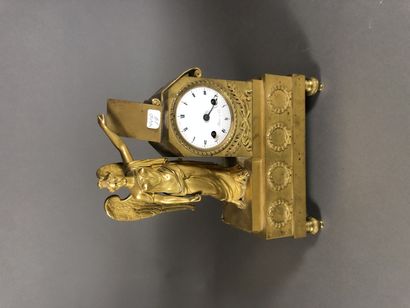 Small gilded chased bronze clock.
Signed...