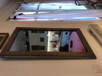 Two mirrors in the Louis XVI style In carved...