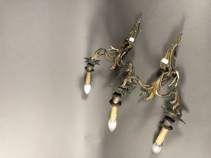 Pair of bronze sconces with two arms of light.
Style...