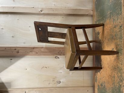 Set of Four armchairs:
One in light wood,...