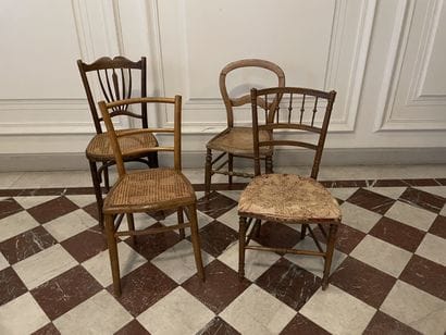 Set of four cane or straw chairs.
A wheel...