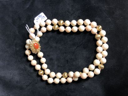 Necklace of two rows of creamy pink coral...