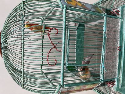 Cage à oiseaux

Birdcage

Made of green ...