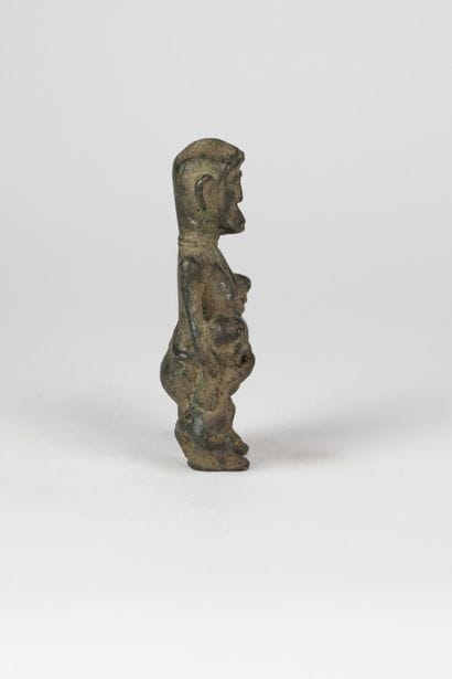 Figure de singe entourée de ses deux petits
Bronze...