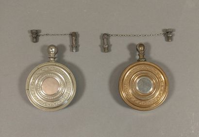 Set of 2 circular gasoline lighters in tin...