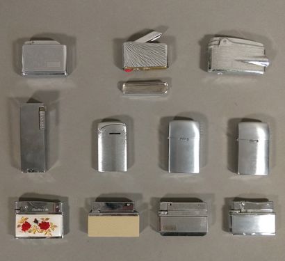 Lot of 11 gas lighters most of them in their...