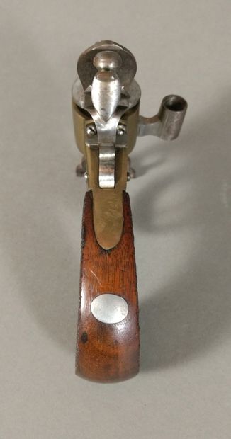 A brass and iron flintlock table lighter...