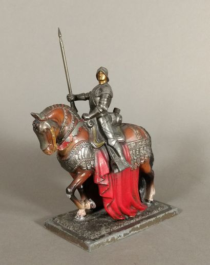 Polychrome regula table lighter representing...