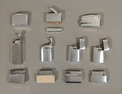 Lot of 11 gas lighters most of them in their...