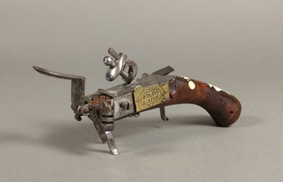 Brass and iron flint table lighter with bone...