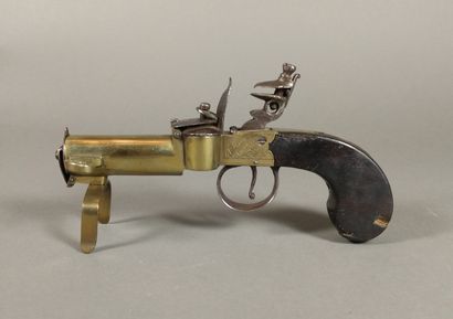 Brass and iron flint table pistol lighter...