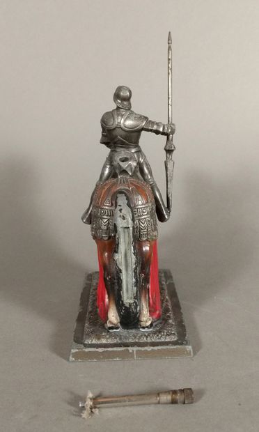 Polychrome regula table lighter representing...