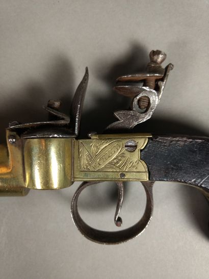 Brass and iron flint table pistol lighter...