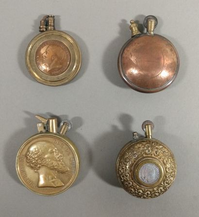 Set of 4 circular gasoline lighters in copper...