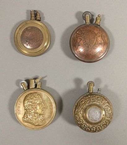 Set of 4 circular gasoline lighters in copper...