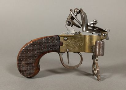 A brass and iron flintlock table lighter...