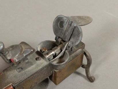 Gasoline lighter with the imitation of a...