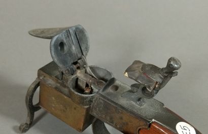 Gasoline lighter with the imitation of a...