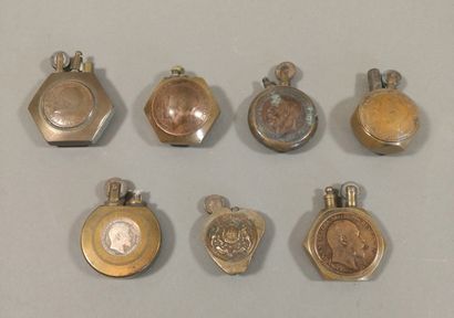 Lot of 7 copper or brass lighters made of...