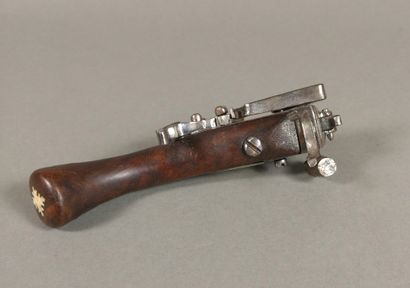 Brass and iron flint table lighter with bone...