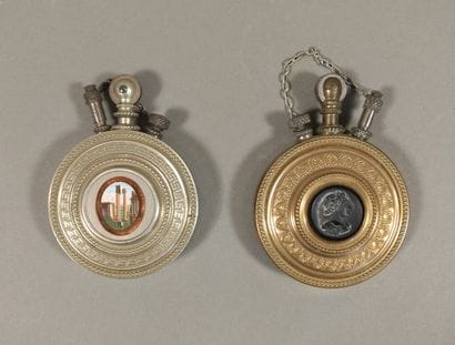 Set of 2 circular gasoline lighters in tin...