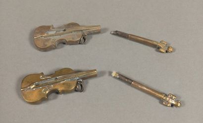 Set of 6 lighters : 

- two metal key-shaped...
