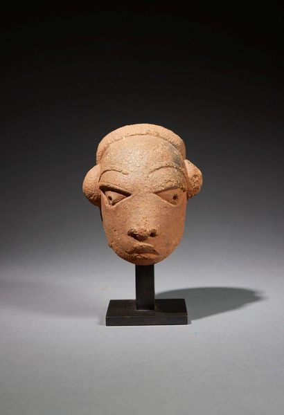 Nok head
Nigeria 500 B.C. - 500 A.D.
Terracotta
H....