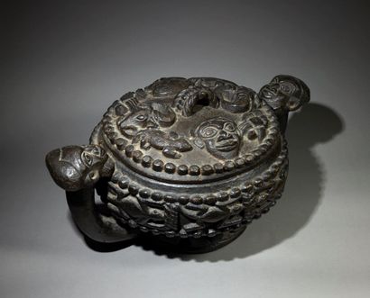 Carved Bamoum cup
Cameroon
Wood with black...