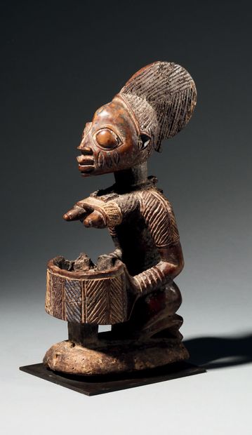 Yoruba cup bearer, Nigeria
Wood, natural...