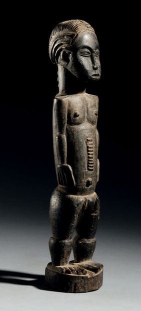 Baule male figure, Ivory Coast
Wood
H. 24...