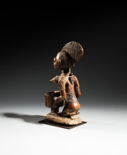 Yoruba cup bearer, Nigeria
Wood, natural...