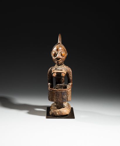Yoruba cup bearer, Nigeria
Wood, natural...