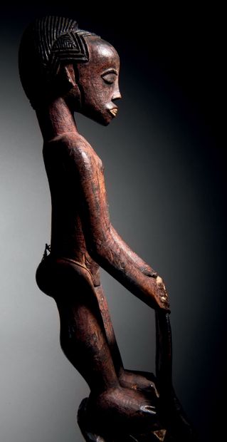 Ɵ Gouro mask surmounted by a figure, Ivory...