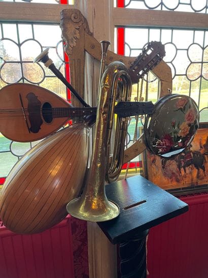 Sculpture of a set of instruments including...