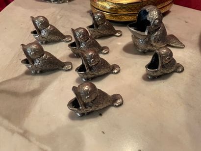 Set of eight table ashtrays
In metal with...