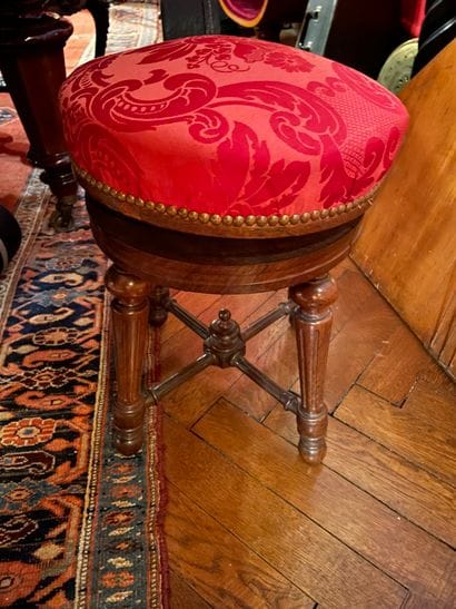Natural wood carved piano stool
Napoleon...