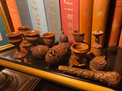 Set of corozo wood objects: four egg cups,...