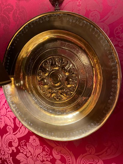 Important repoussé and engraved copper quest...