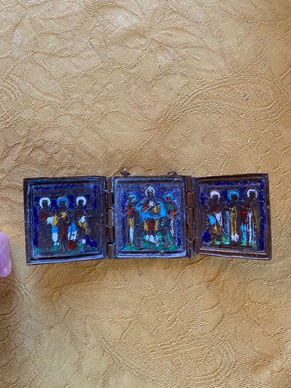 Small polychrome enamelled bronze triptych...