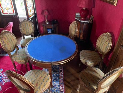 Suite of eight carved and gilded wood chairs
Fluted...