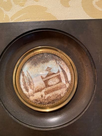 Miniature tomb in hair
A miniature with a...
