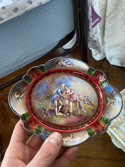 Polychrome enamel cup decorated with characters
Modern...