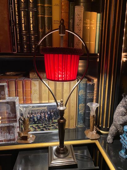 Pair of lamps in bronze with a medal patina,...