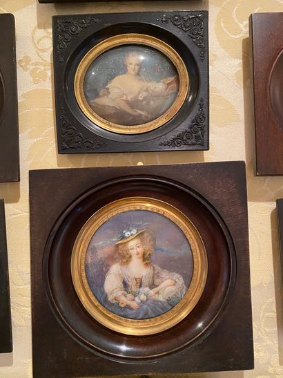 Three miniatures, two of which are in the...