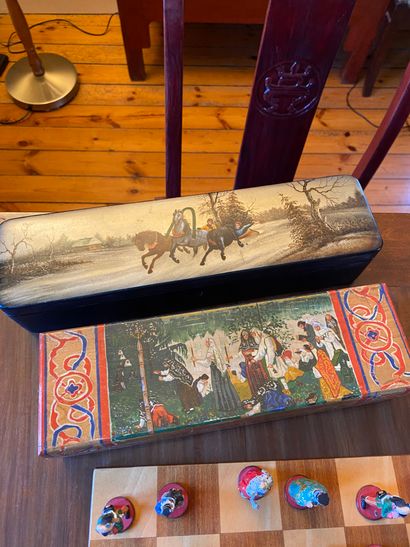 Two lacquered papier-mâché boxes depicting...