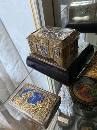 Set of three metal boxes, one of which is...