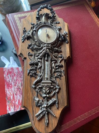 Silver barometer-thermometer decorated with...