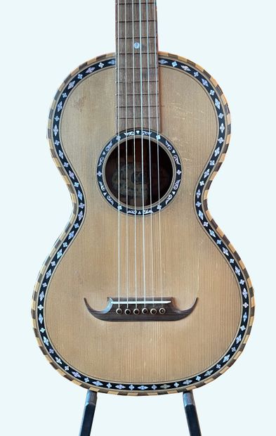 Six strings guitar, one piece back and sides...