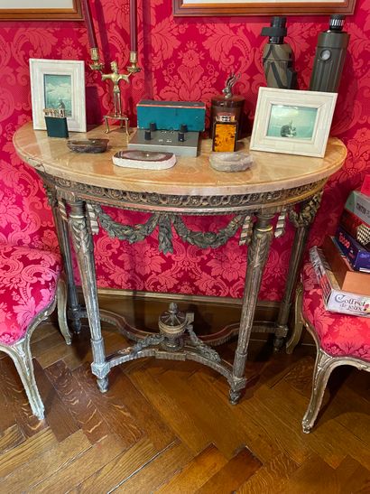 Half-moon console in carved and gilded wood
Tapered...