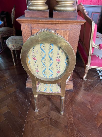 Suite of eight carved and gilded wood chairs
Fluted...
